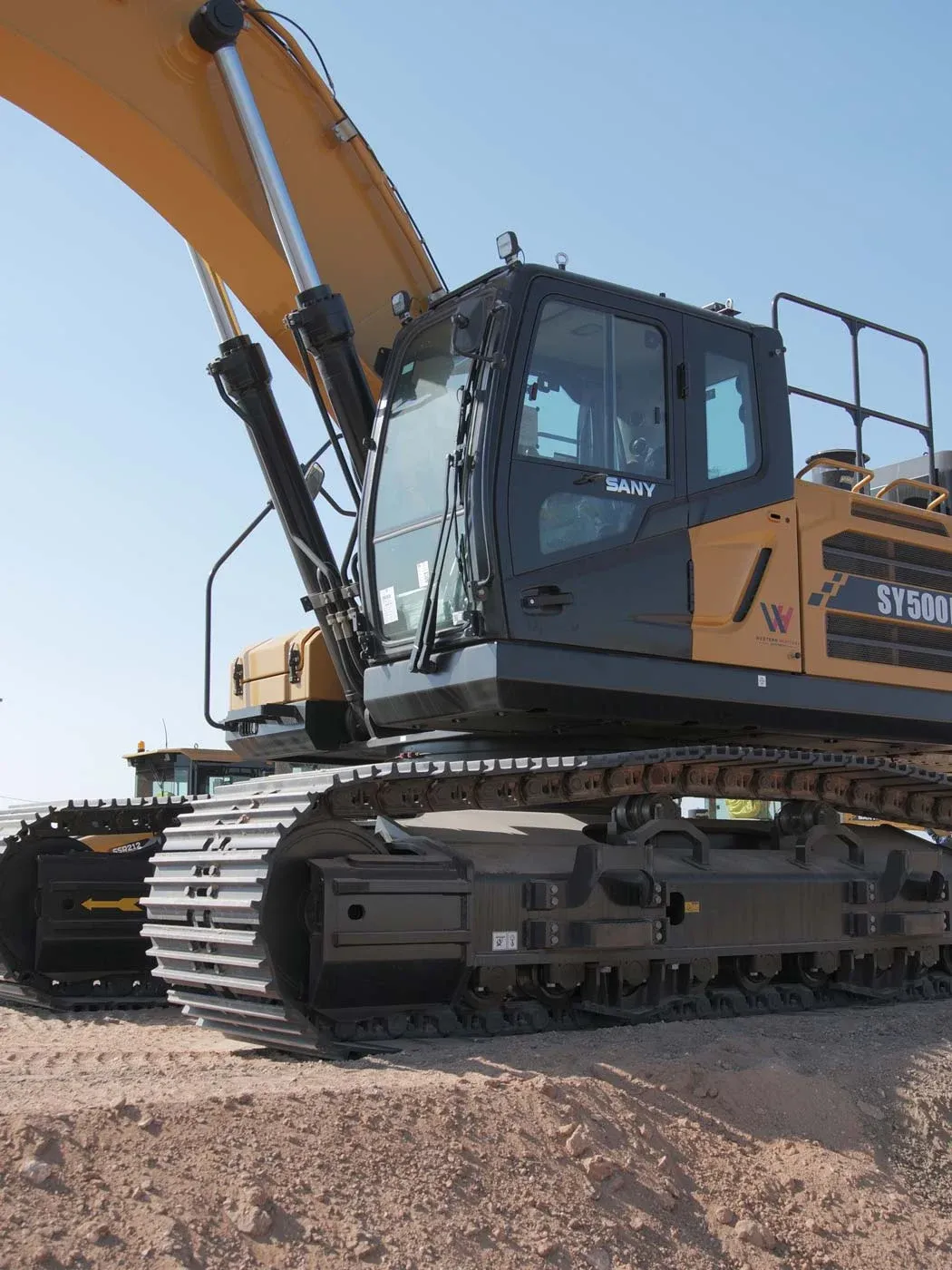A SANY SY500H tracked excavator parked on a prepared job site.